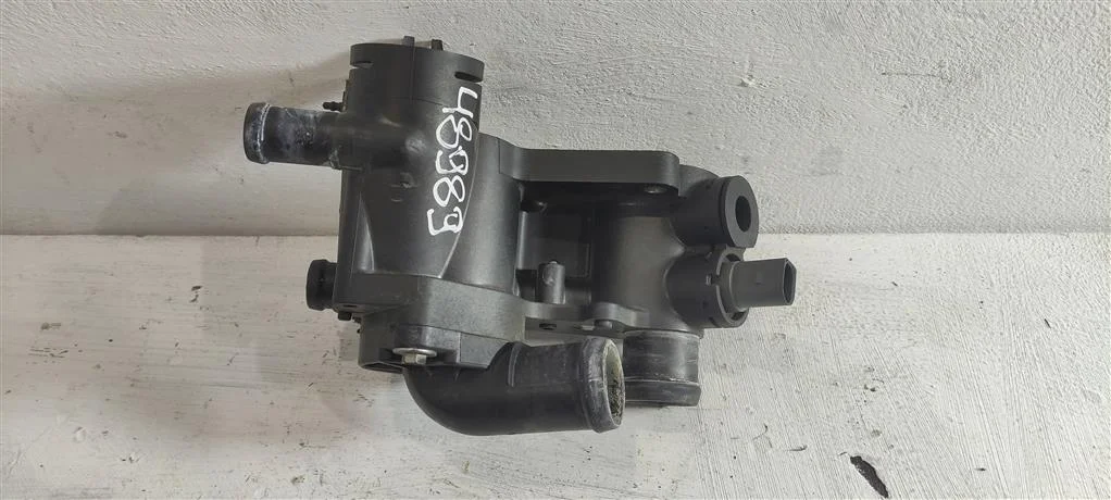 Корпус термостата 032121111CG  1.4 Бензин Skoda