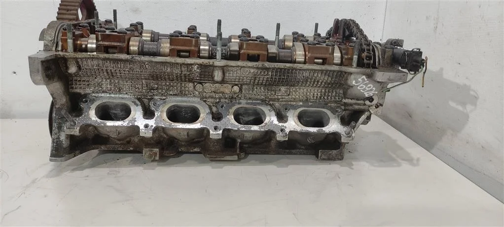 Головка блока цилиндров (ГБЦ) AUQ  1.8 Турбо бенз
