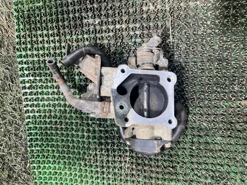 Дроссельная заслонка Kia Spectra