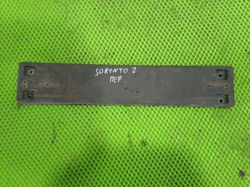 Площадка номерного знака Kia Sorento 2 2013 865192P500 УНИВЕРСАЛ G4KE