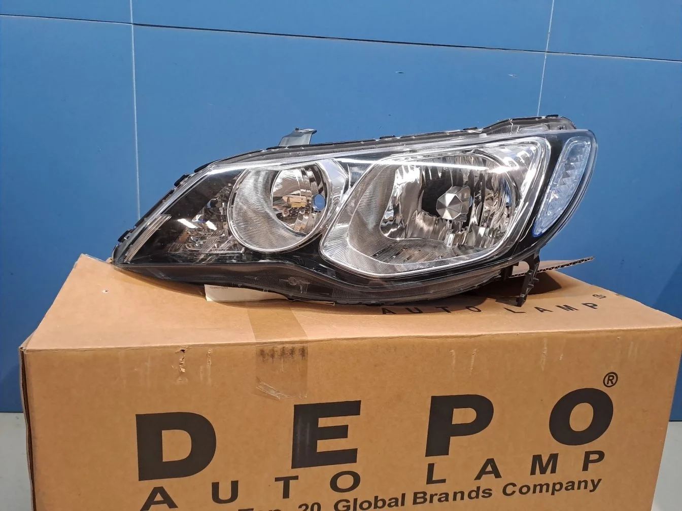 Фара левая для Honda Civic 4D 2006-2012