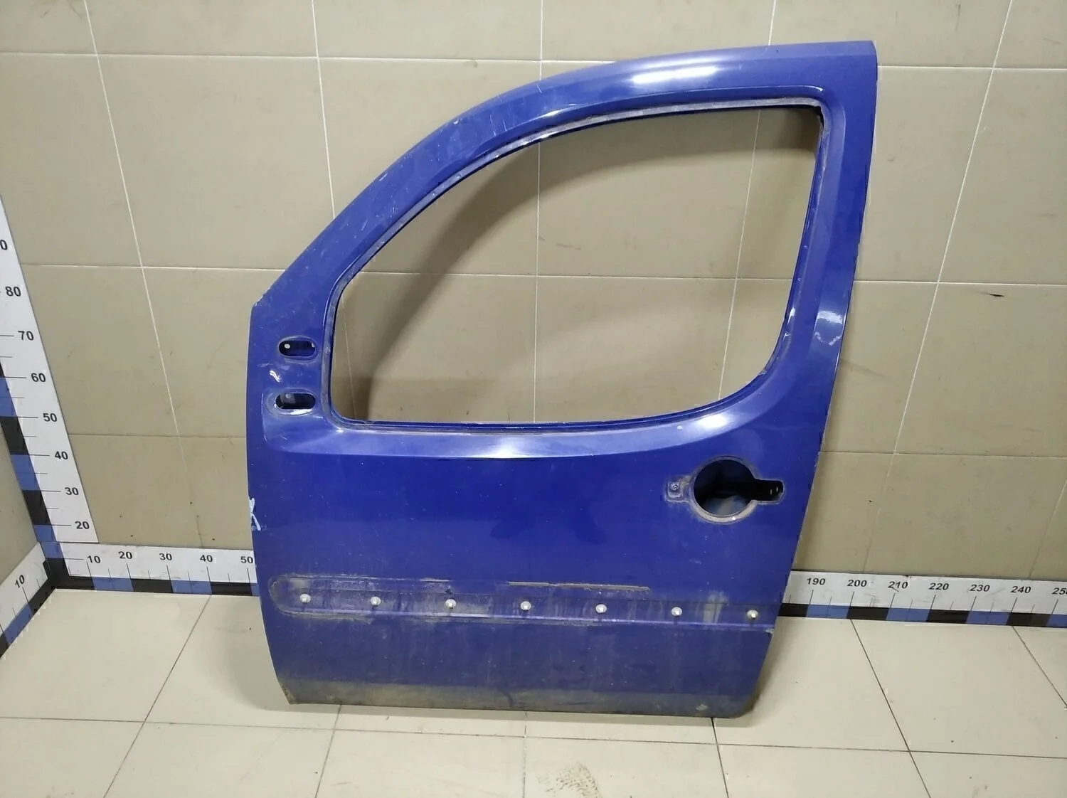 Дверь передняя левая Doblo 2005-2015