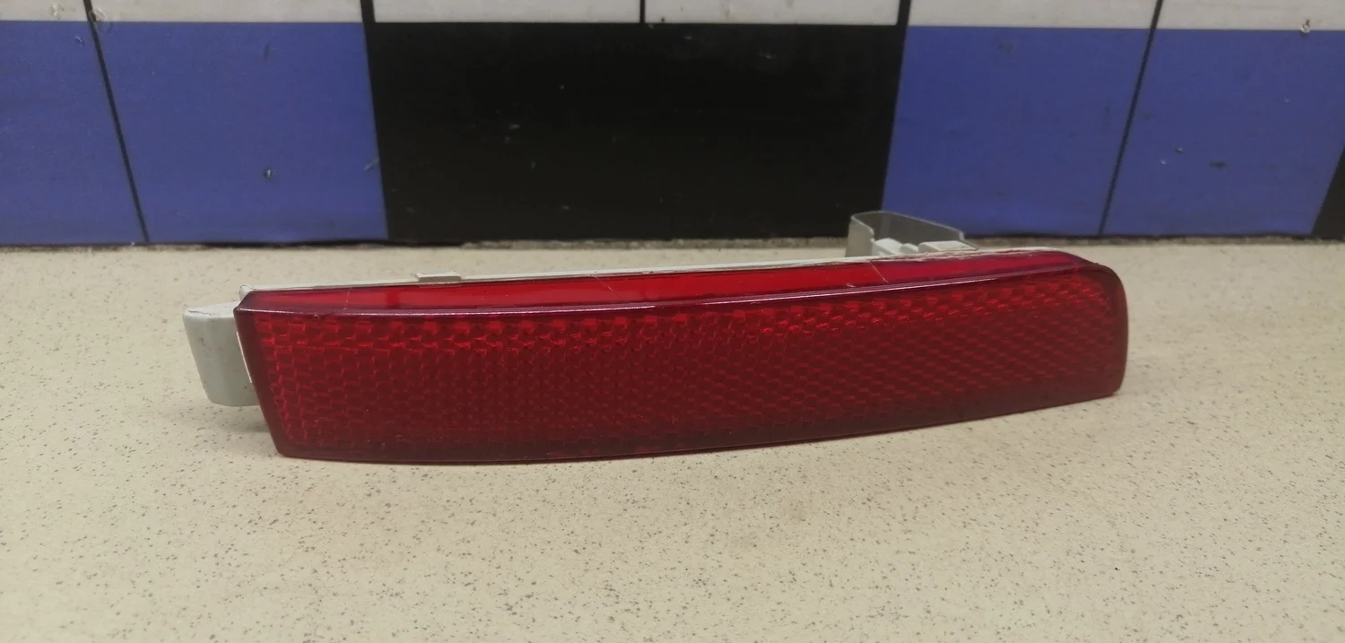 Отражатель в бампер задний левый Juke (F15) 2011>