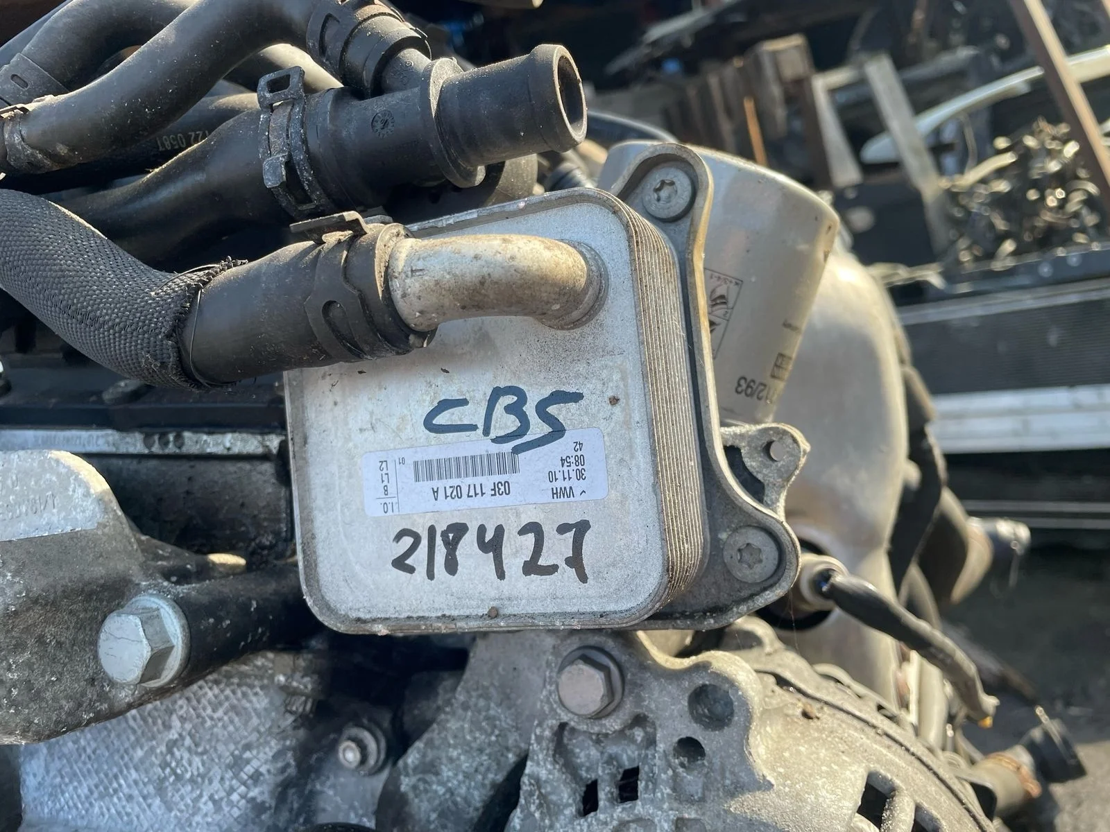 Радиатор масляный двигателя теплообменник AUDI A3, SKODA OCTAVIA 1Z, VOLKSWAGEN GOLF 5/5+/6, PASSAT B6/B7/CC, TIGUAN 1,2 CBZB  2005- б/у A3(2004-2013);OCTAVIA 1Z(2004-2012);GOLF 5(2004-2009);JETTA 6(2011-);PASSAT B6(2005-2010)