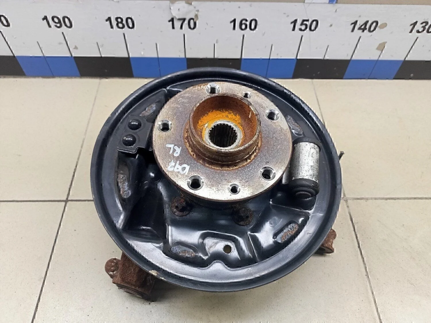 Кулак поворотный задний левый Duster 2012>