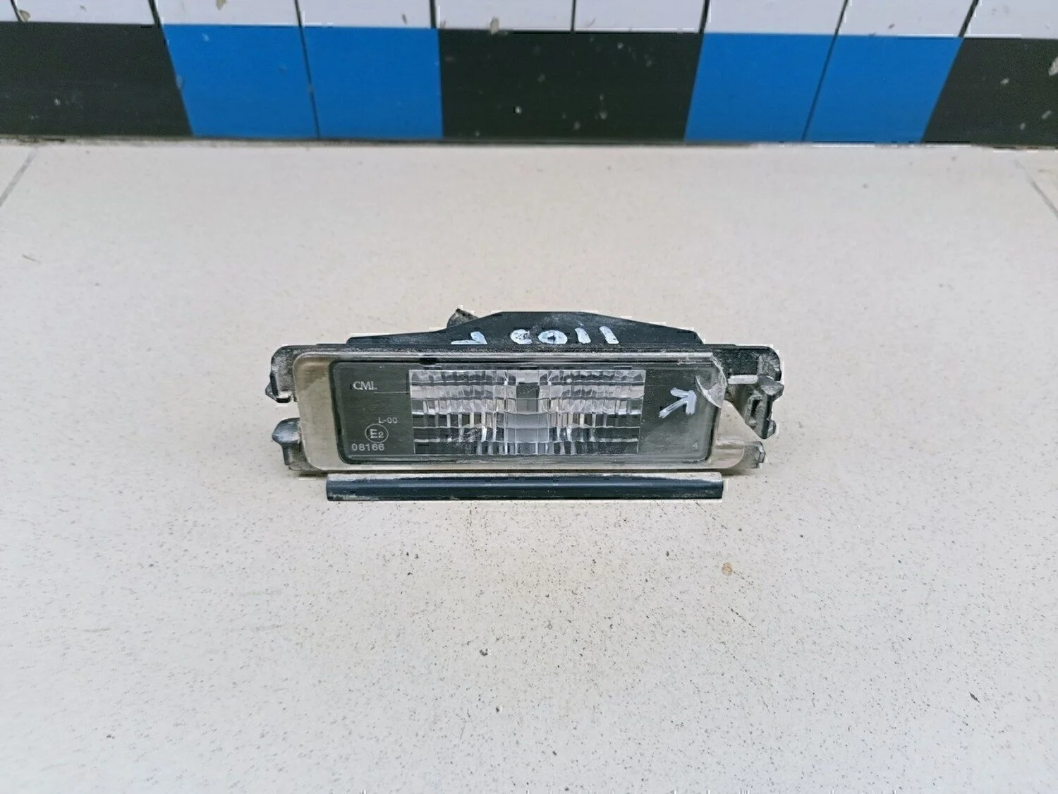 Фонарь подсветки номера Logan 2005-2014