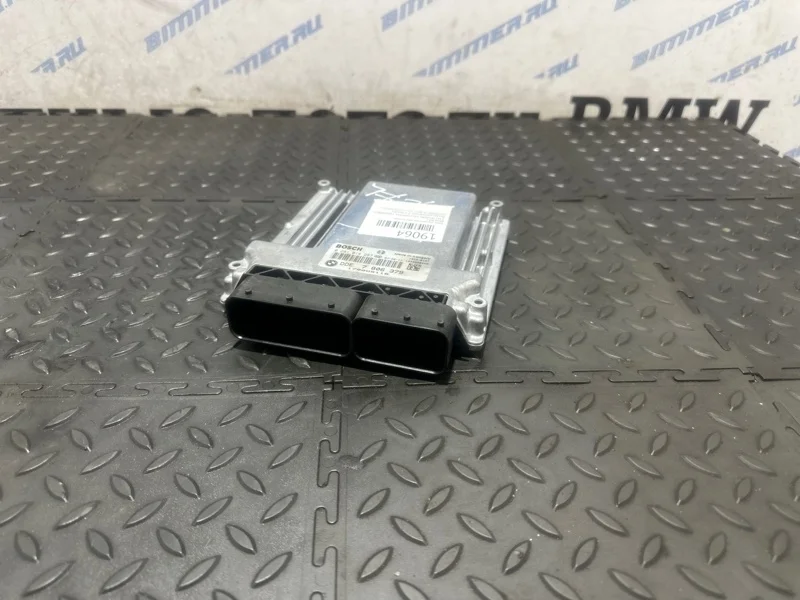 Блок управления двигателем BMW 13617810980 E92 М57
