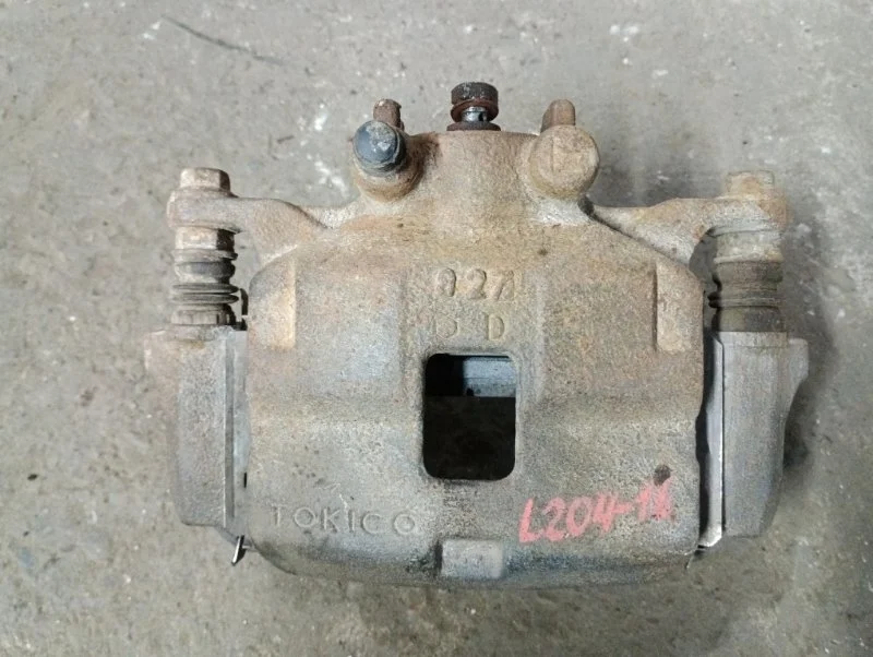 Суппорт передний левый Mitsubishi L200 (2006-2015) 2008 4605A201 ПИКАП 2.5 D 4D56