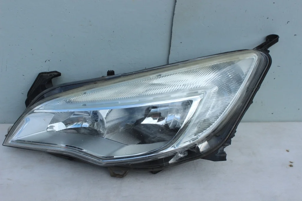 Фара хромированная левая б/у Opel Astra J JФР47