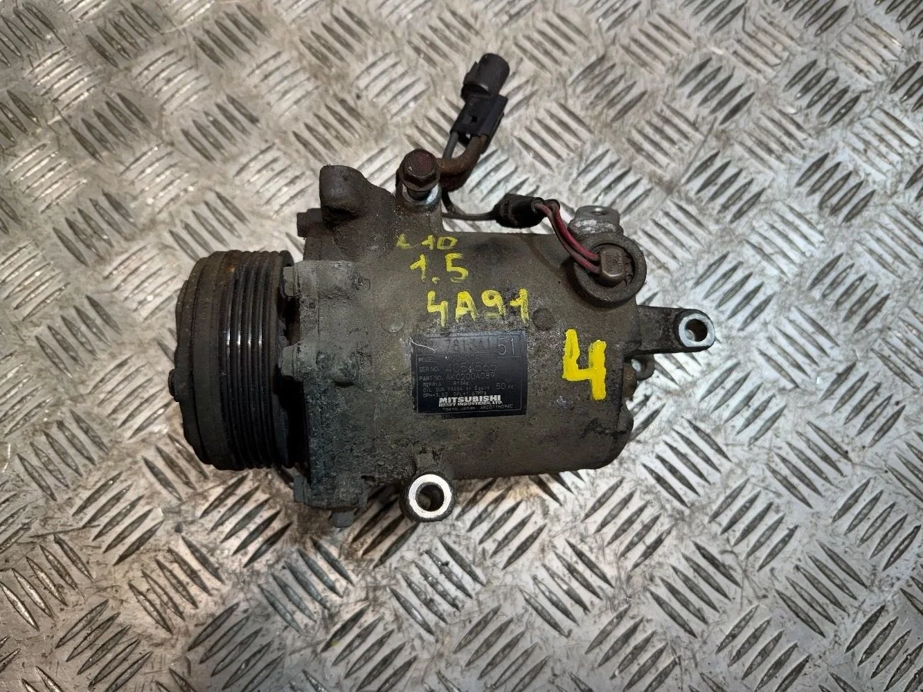 Компрессор кондиционера на Mitsubishi lancer 10