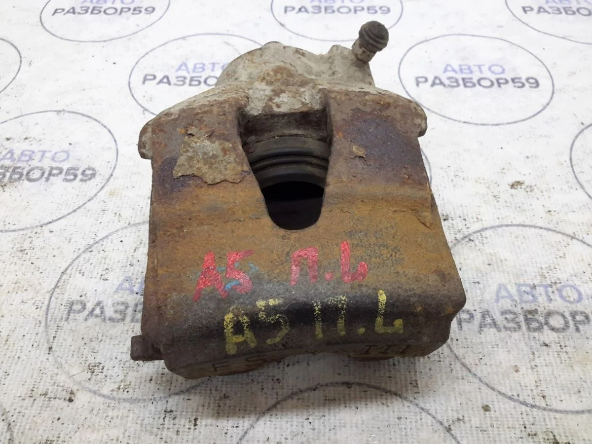 Суппорт передний левый Skoda Octavia II (2004—2009)