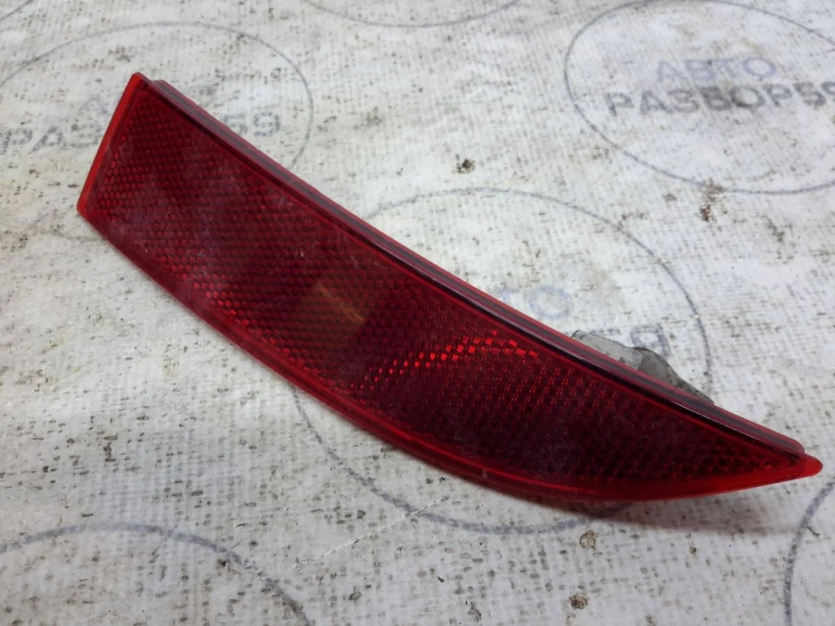 Отражатель задний Renault Logan II (2012—2018)