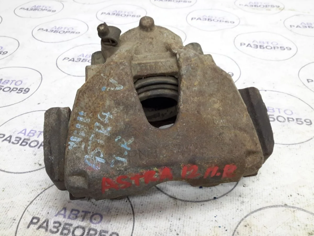 Суппорт передний правый Opel Astra H рестайлинг (2006—2014)