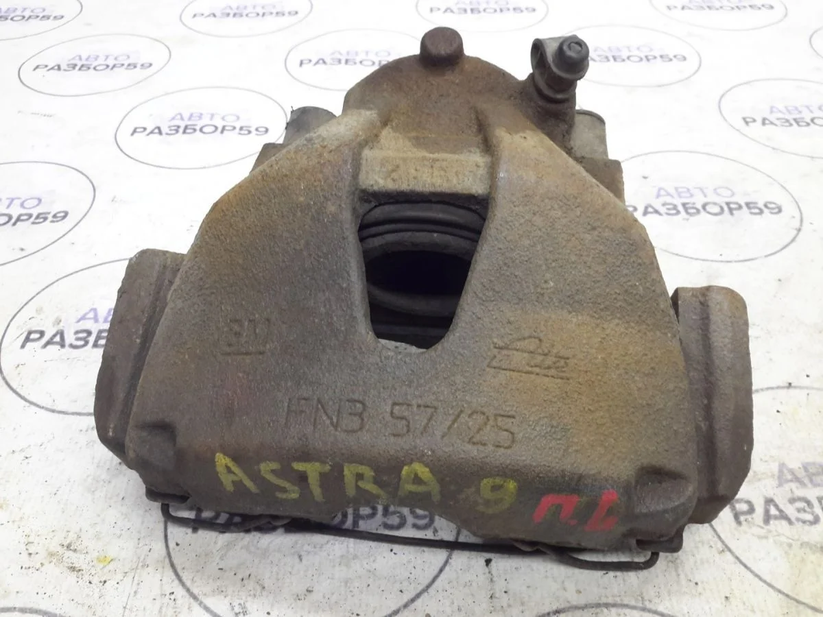 Суппорт передний левый Opel Astra H рестайлинг (2006—2014)