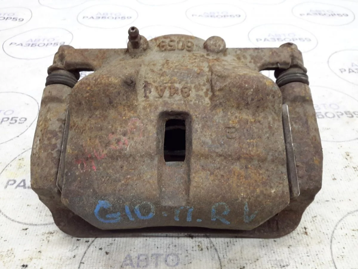 Суппорт передний правый Nissan Qashqai I (2006—2010)