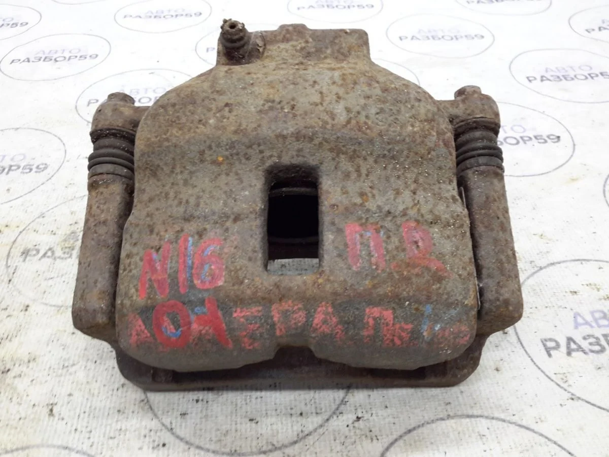 Суппорт передний правый Nissan Almera N16 (2000—2003)