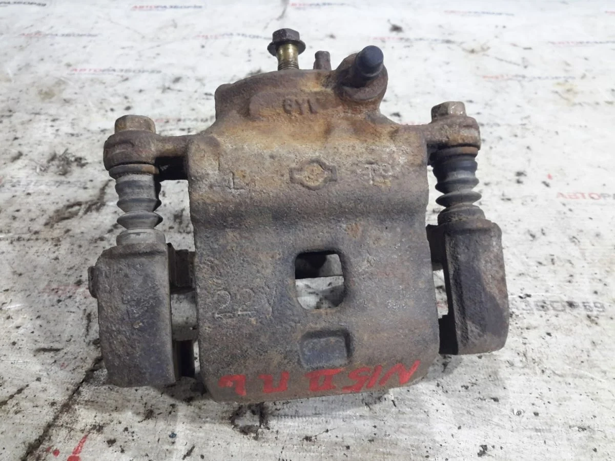 Суппорт передний левый Nissan Almera N15 (1995—2000)