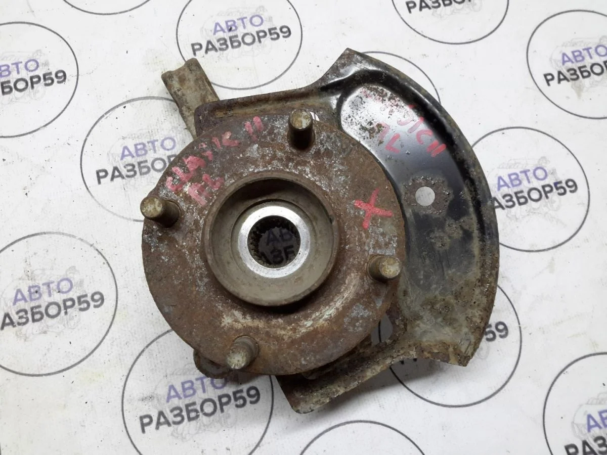 Кулак передний левый Nissan Almera Classic I (2006—2013)