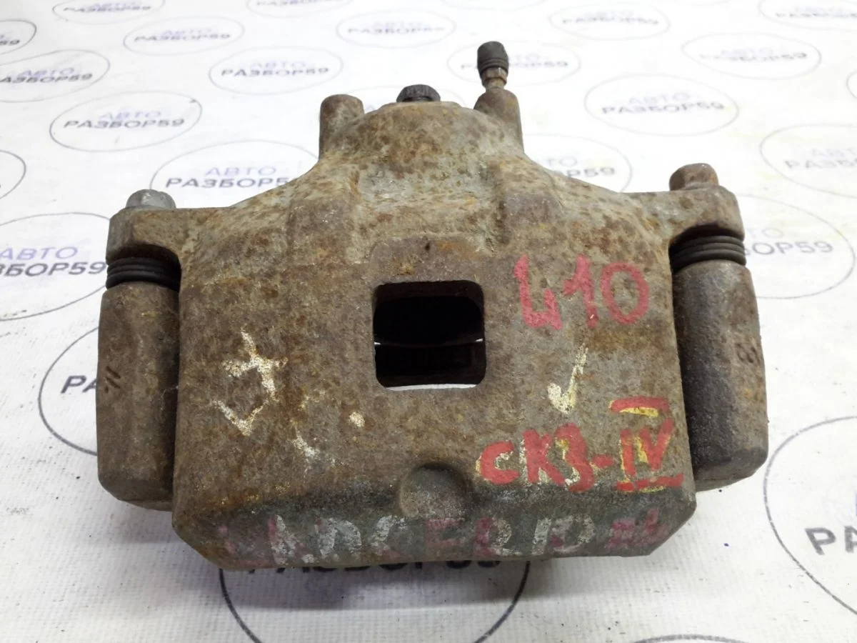 Суппорт передний левый Mitsubishi Lancer X (2007—2010)