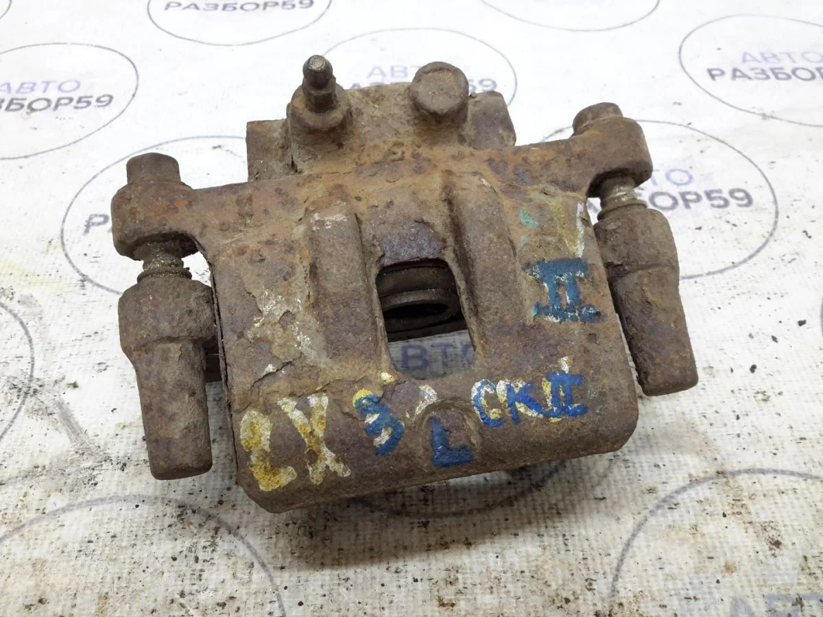 Суппорт задний левый Mitsubishi Lancer X (2007—2010)