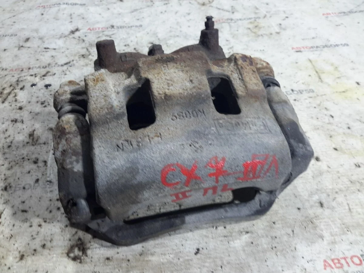 Суппорт передний левый Mazda CX-7 I (2006—2009)