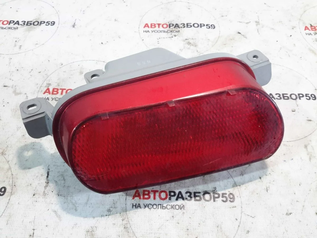 Фонарь противотуманный задний Mazda CX-7 I (2006—2009)