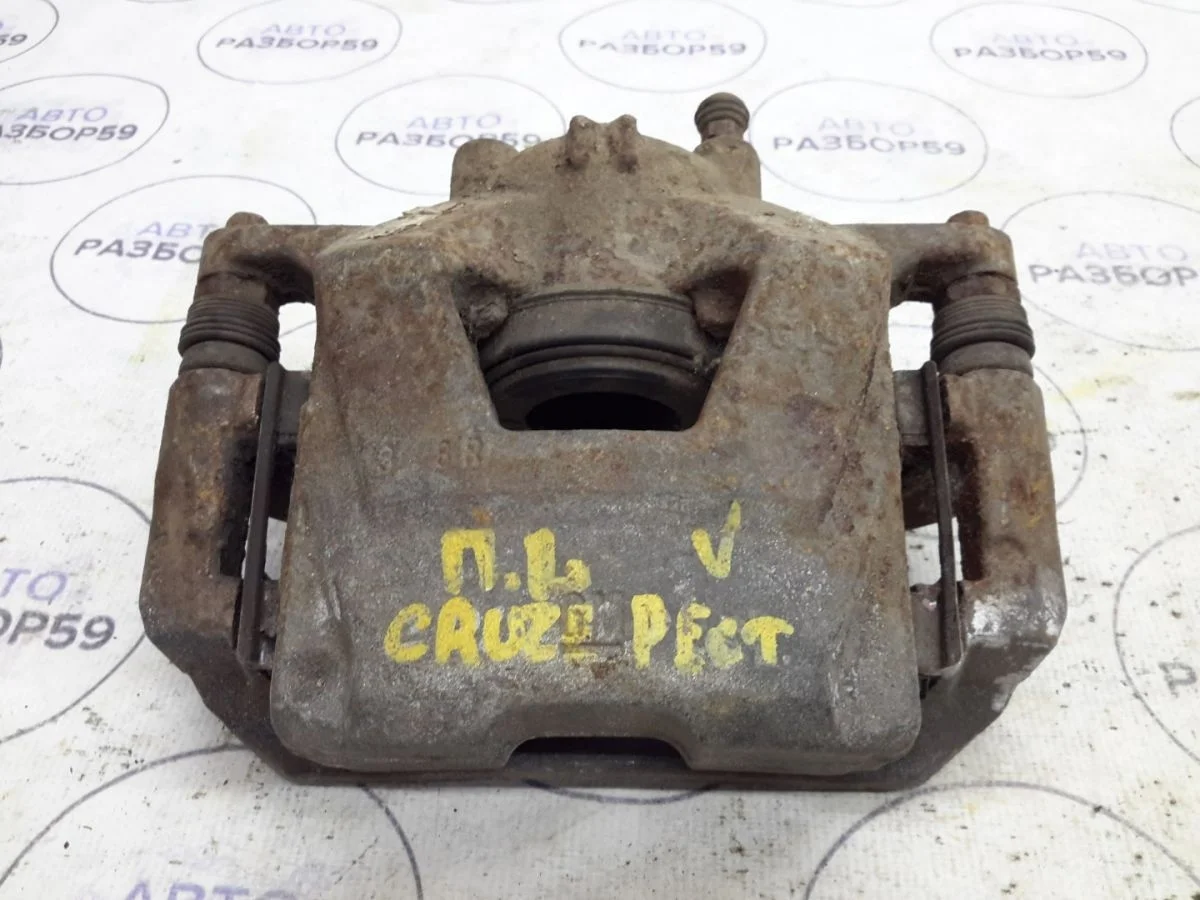 Суппорт передний левый Chevrolet Cruze I (2009—2012)