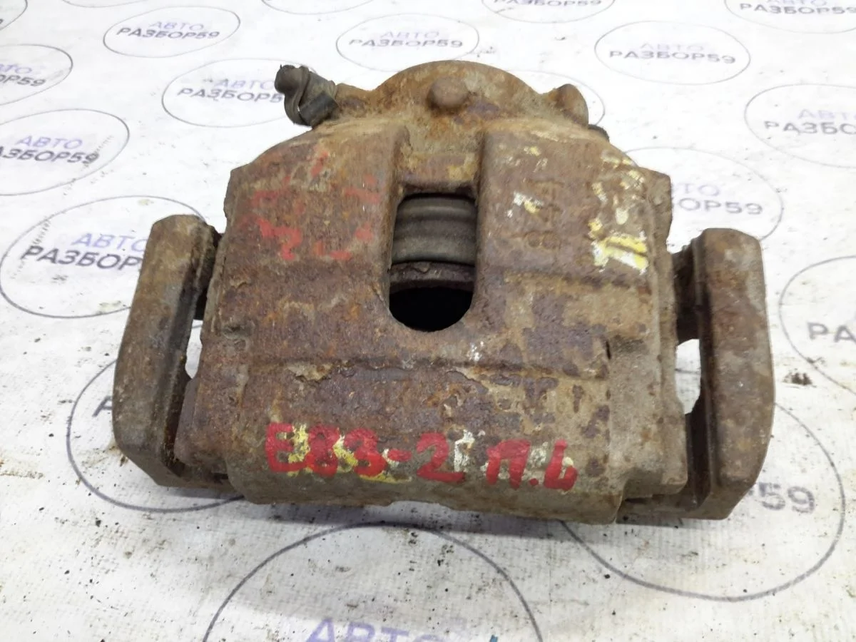 Суппорт передний левый BMW X3 E83 (2003—2006)