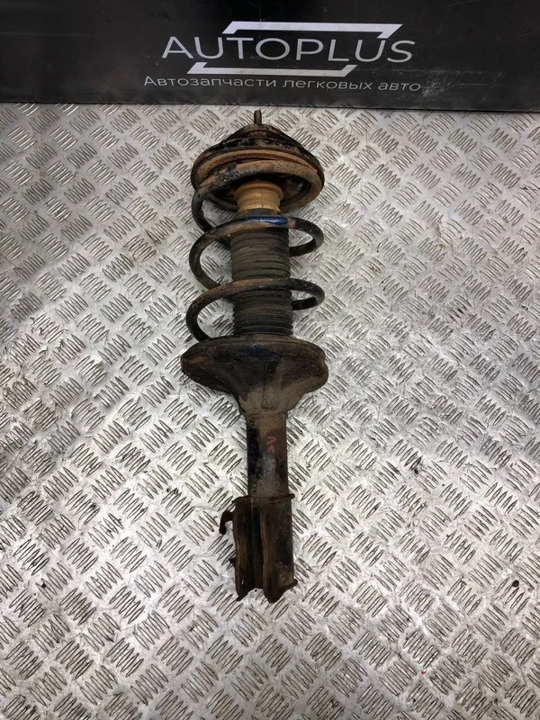 Стойка подвески Mitsubishi Lancer 2006 4060A320 СЕДАН IX 4G18, передняя левая