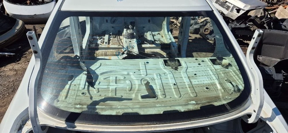 Стекло заднее для Nissan Almera (G15) 2013-2018