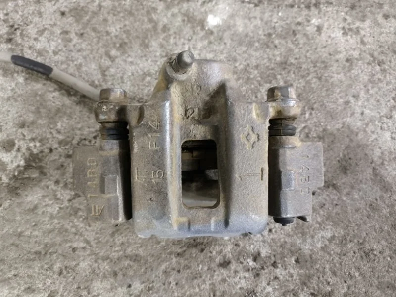 Суппорт задний левый Toyota Land Cruiser Prado 150 (2009-2023) 2012 4775034030 2.7 I 2TRFE