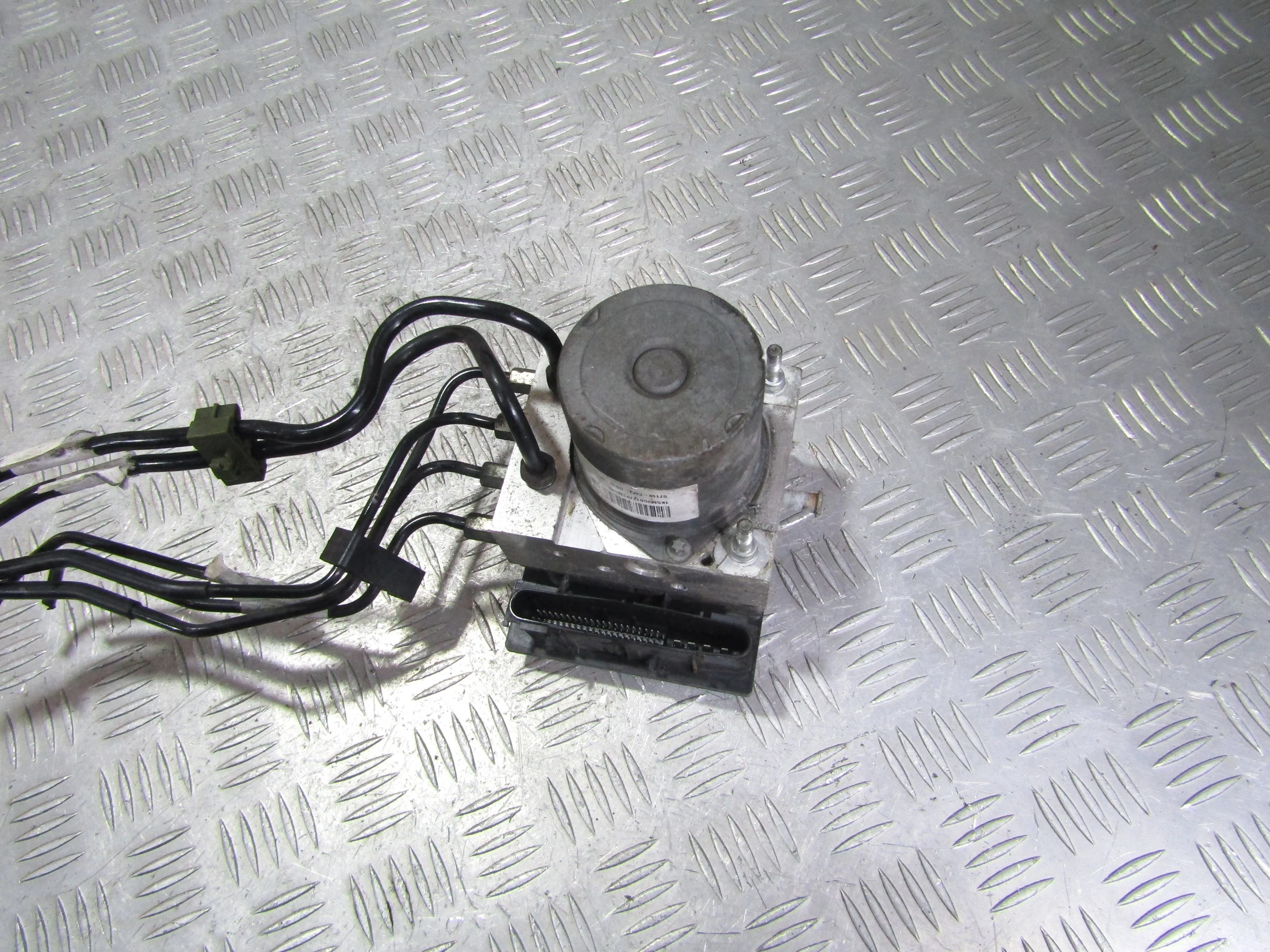 Блок ABS (насос) HONDA Civic VIII (2005—2009)