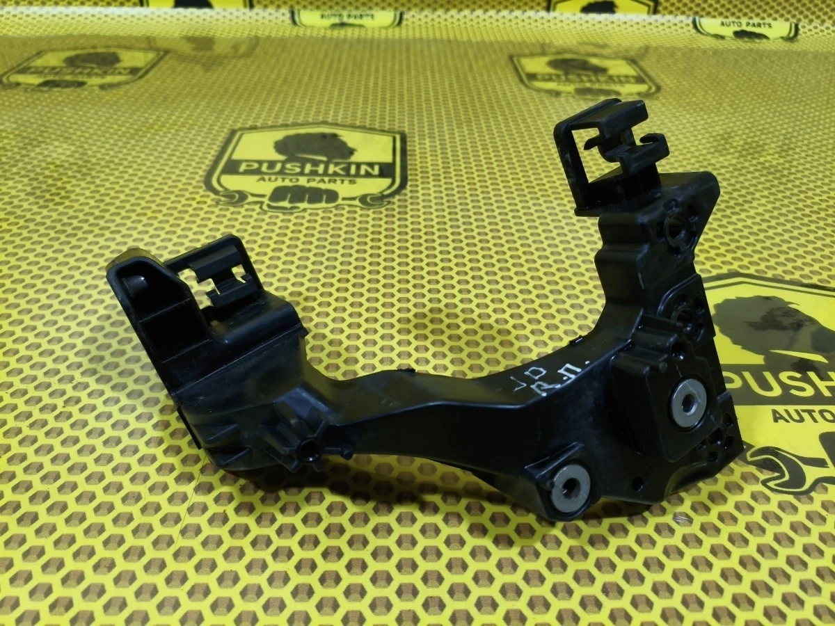 Кронштейн фары Kia Ceed 2013 64166A2000 JD G4FG, правый