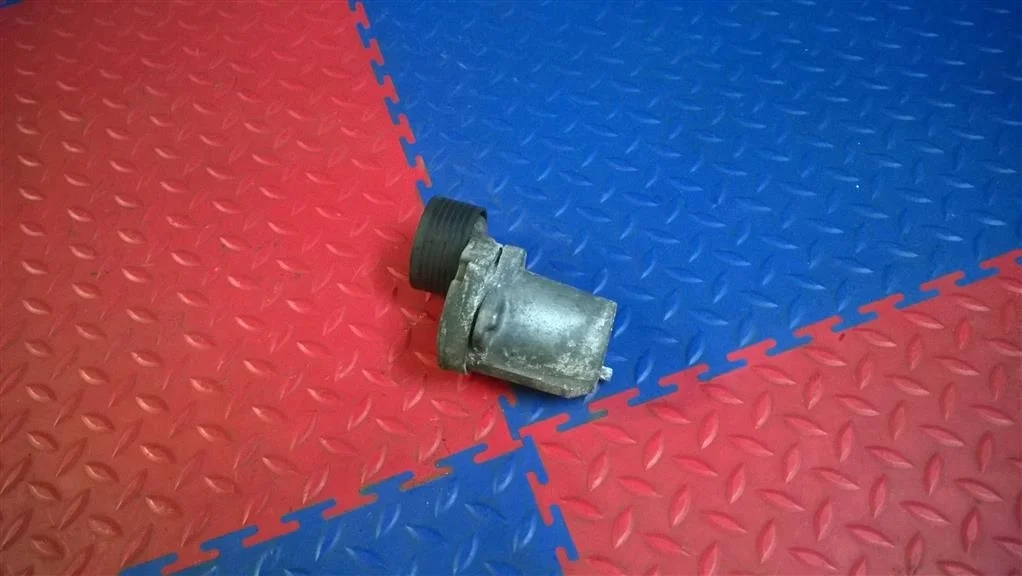 натяжитель ремня BMW X3 E83  N47D20A 177 л.с. 2.0D