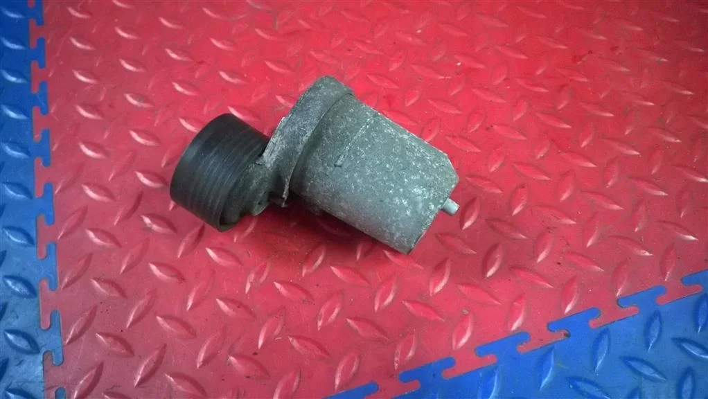 натяжитель ремня BMW X3 E83  N47D20A 177 лс 2.0D