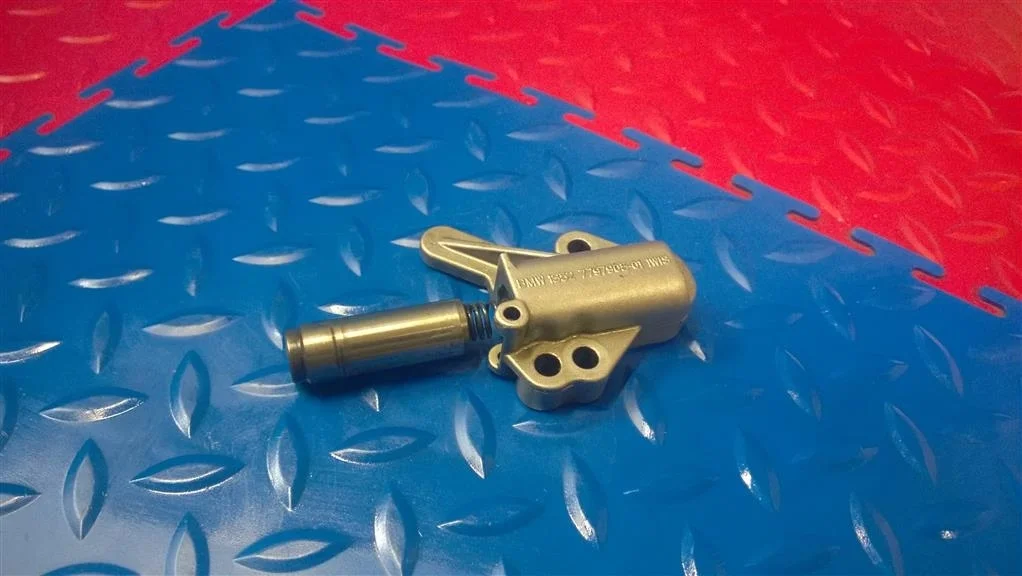 натяжитель цепи BMW X3 E83  N47D20A 177 лс 2.0D