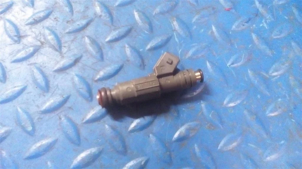 форсунка топливная бензиновая BMW X5 E53