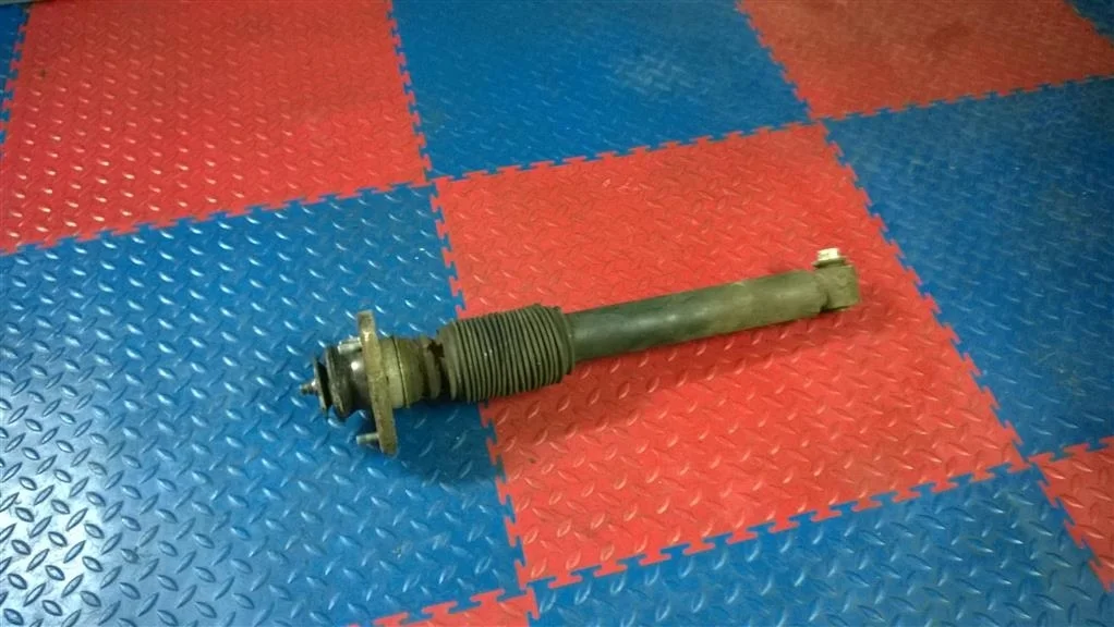 стойка амортизационная BMW X5 E53  M54B30 231 лс 3.0i