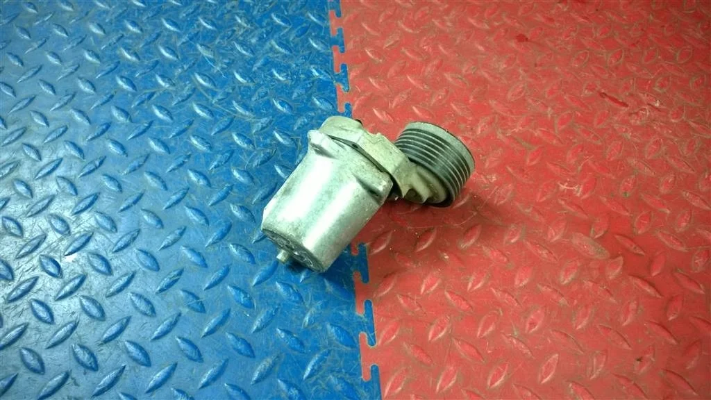 натяжитель ремня BMW X3 E83  N47D20A 177лс 2.0D