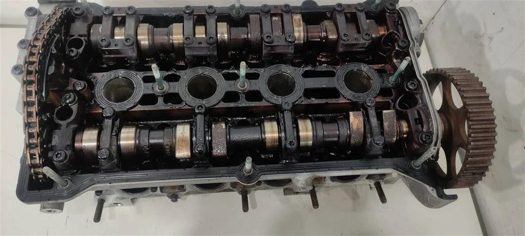 Головка блока цилиндров (ГБЦ) AJH  1.8 Турбо бенз