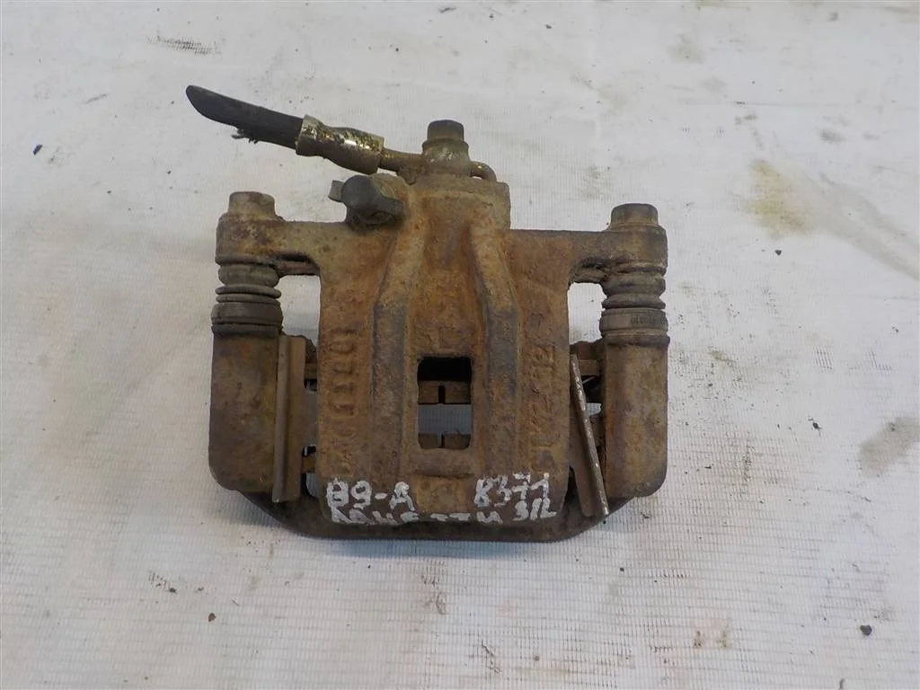 Суппорт задний левый Chevrolet Lacetti I (2004—2013)