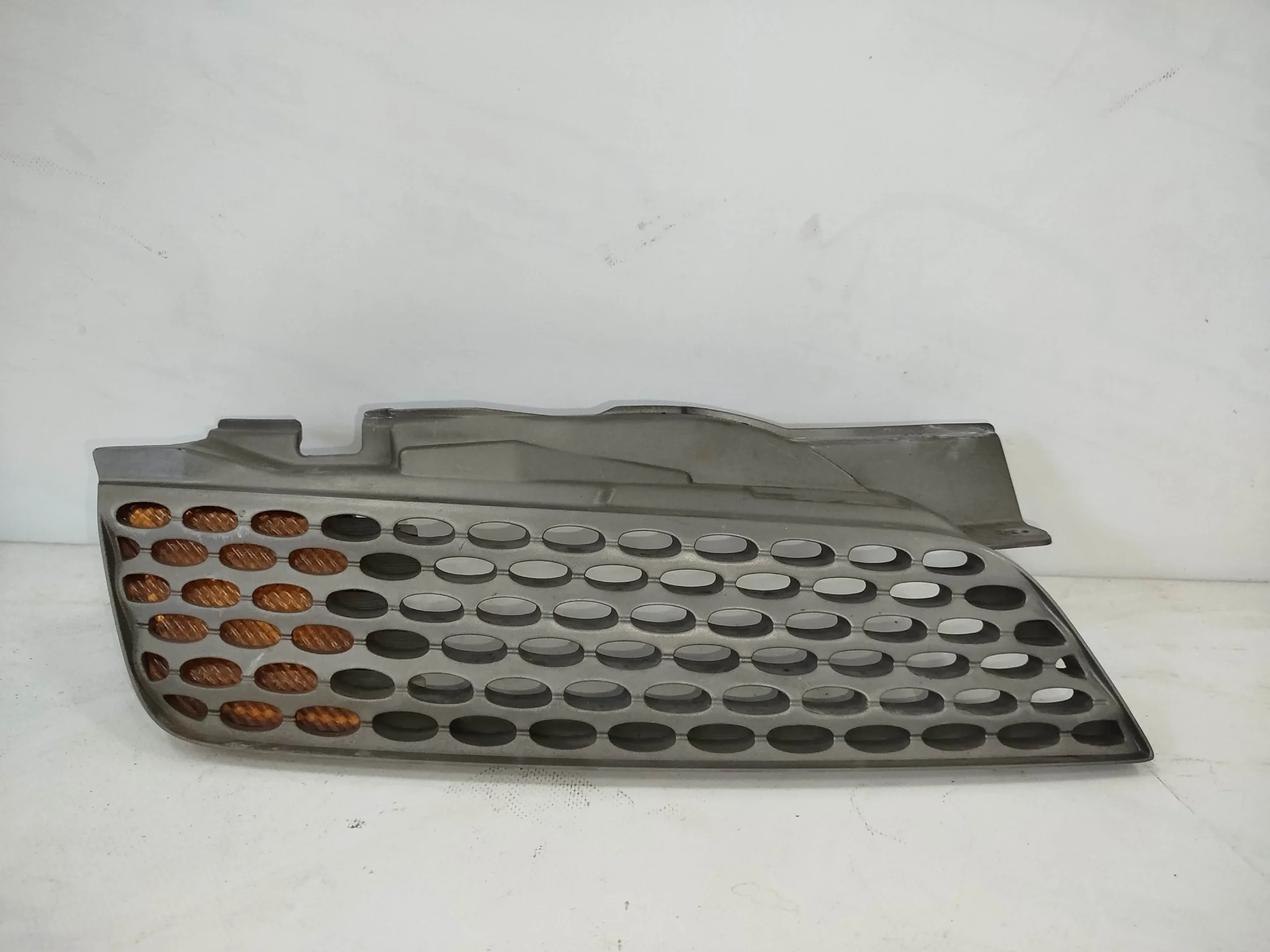 РЕШЕТКА РАДИАТОРА NISSAN ПРАВО 62320AX000 NA7385Z