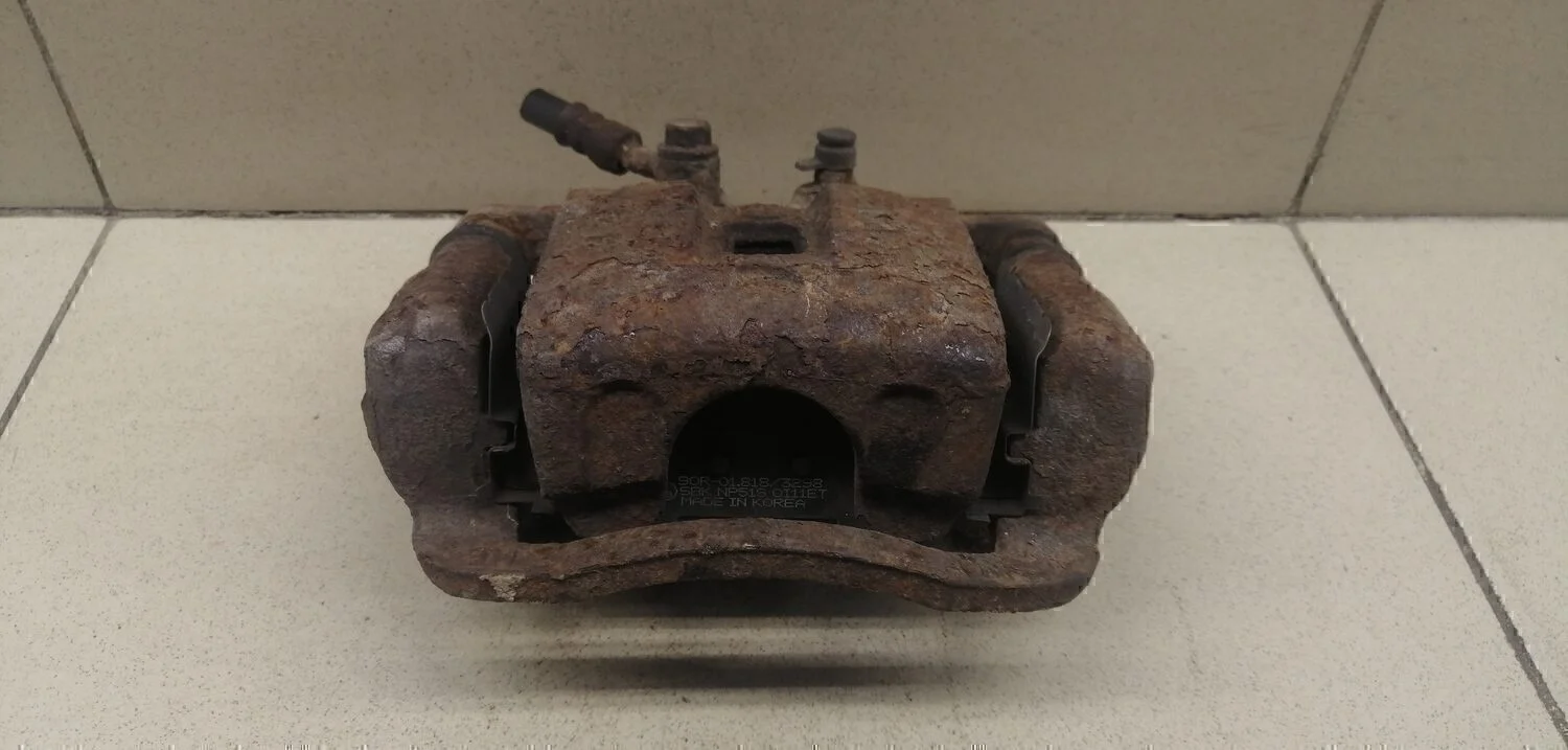 Суппорт задний правый Sorento 2009>