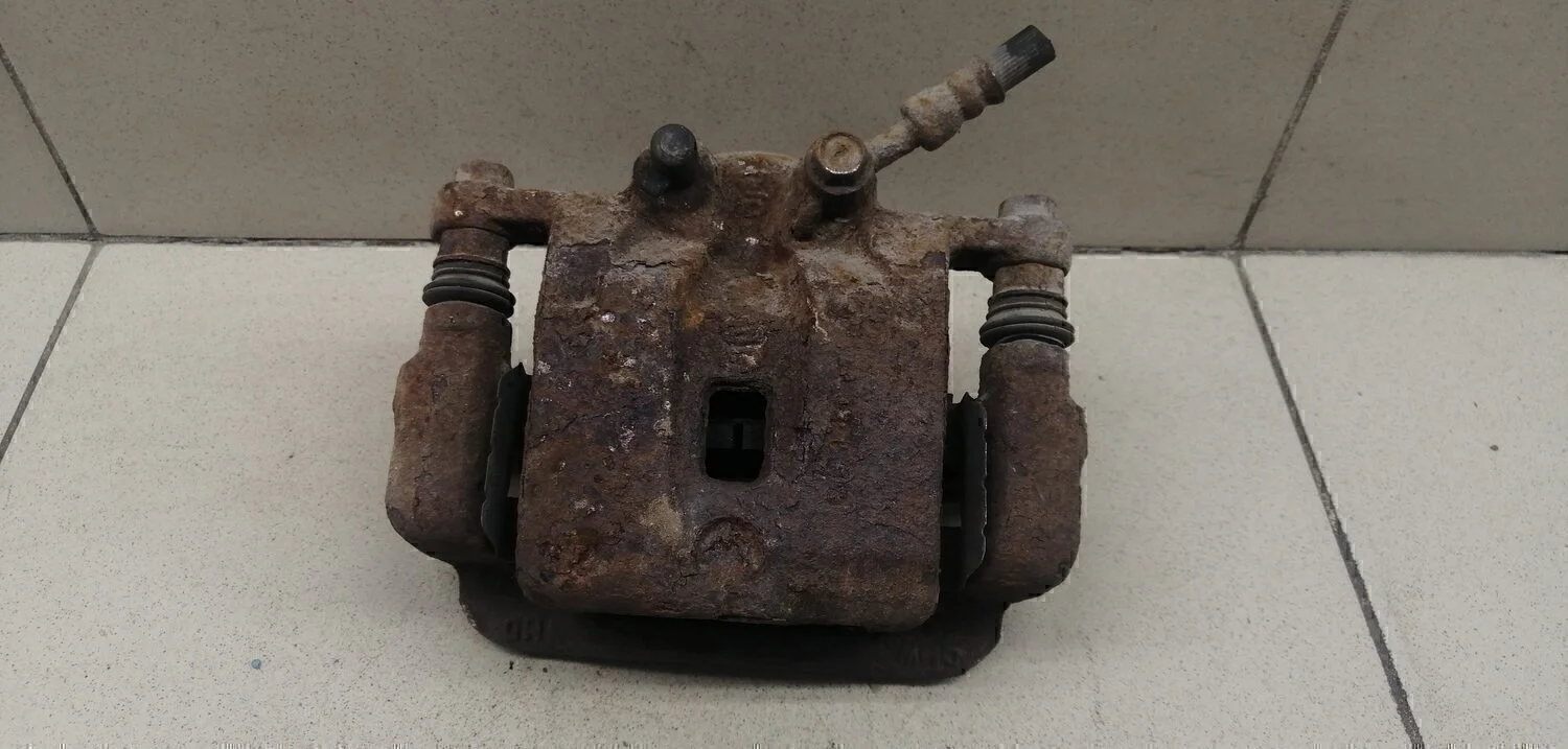 Суппорт задний левый Sorento 2009>