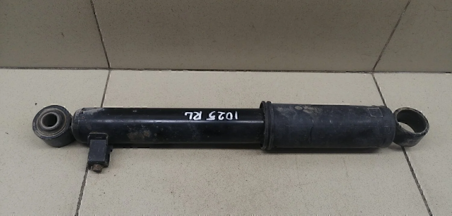 Амортизатор задний левый Sorento 2009>