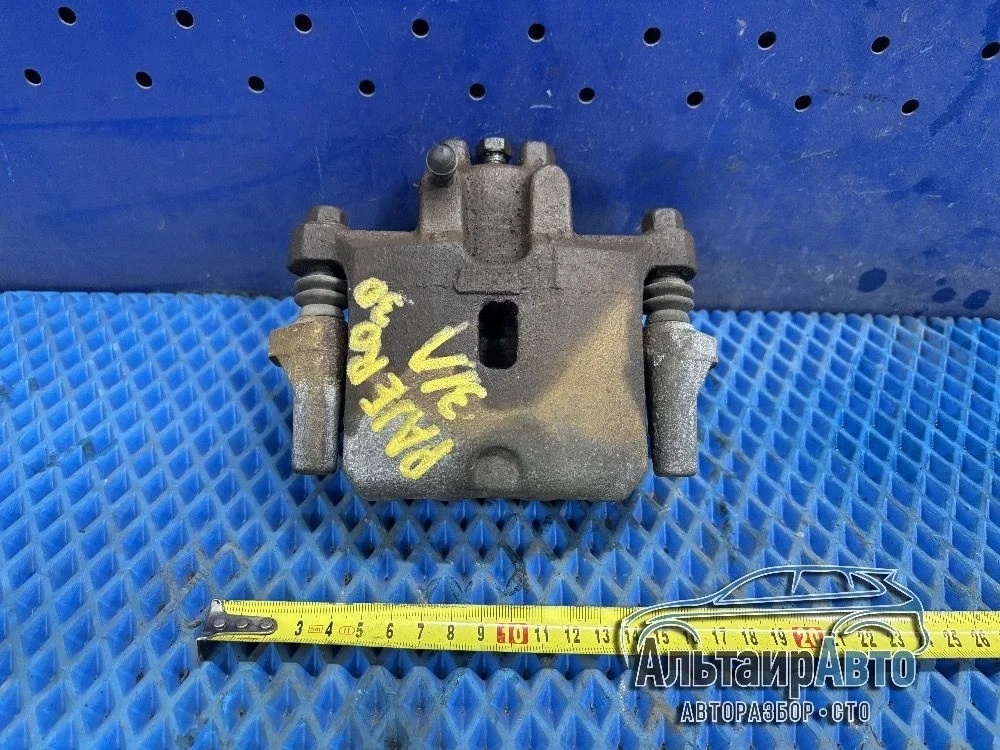 Суппорт тормозной задний левый Mitsubishi Pajero III (1999—2003) Mitsubishi Pajero III (1999—2003) V93W V97W V98W MR510541