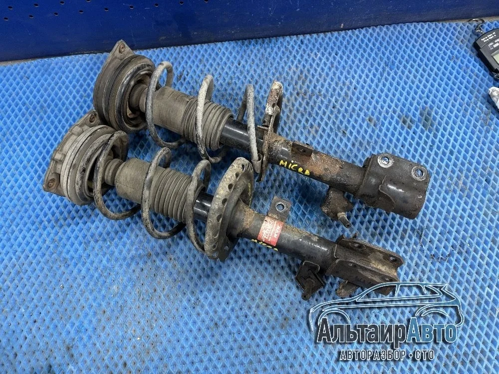 Стойка подвески в сборе Nissan Note E11 (2005—2009) Nissan Note E11 (2005—2009) K12 левый руль E43A3BC60A