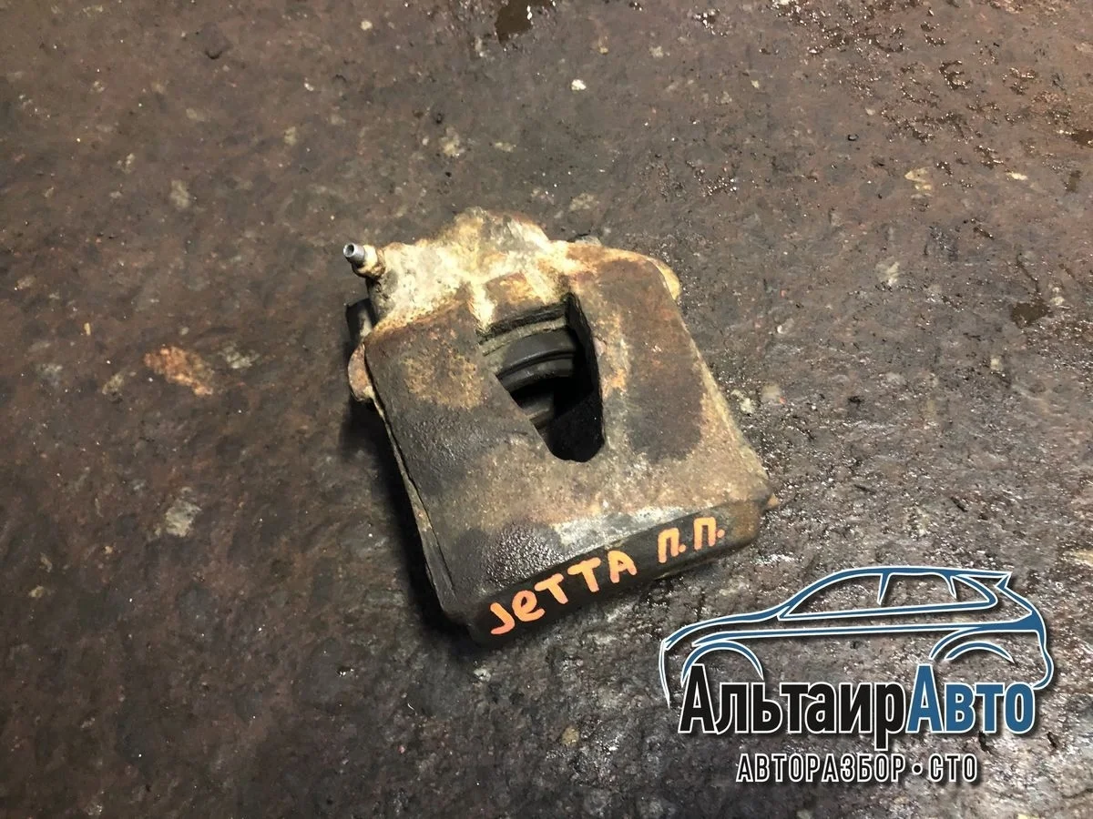 Суппорт тормозной передний Volkswagen Jetta VI (2010—2015) б.у