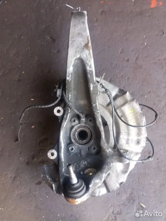 Передний поворотный кулак f01 bmw 31216777749