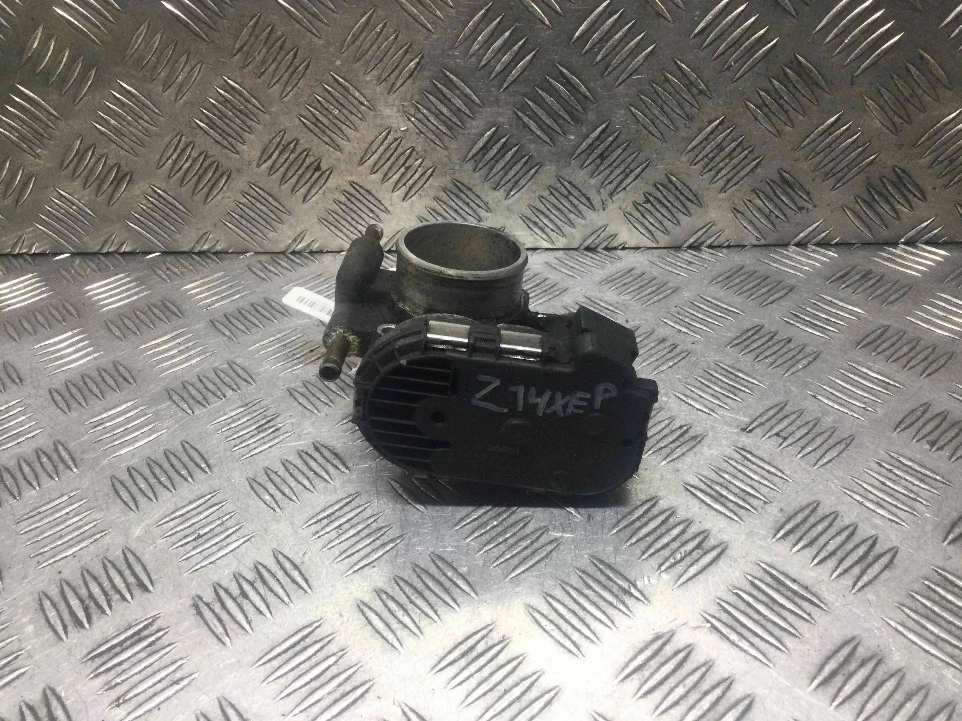 Заслонка дроссельная Opel Corsa C [рестайлинг] (2003-2006) бензин 1.4 i Автомат Х/б